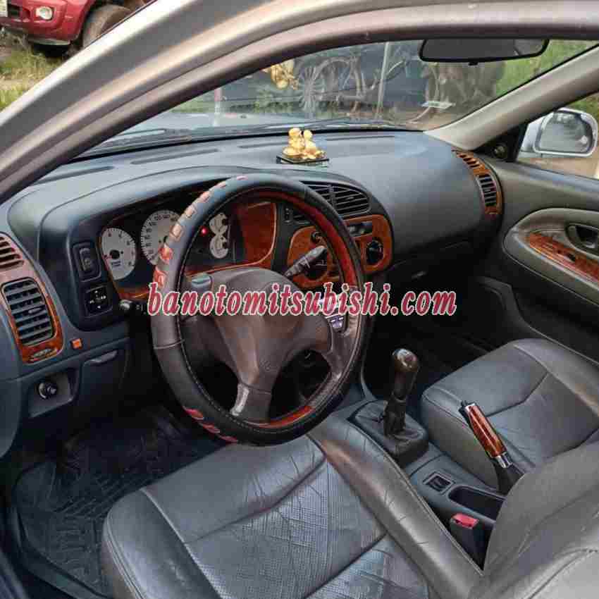 Cần bán nhanh Mitsubishi Lancer GLXI 1.6 MT 2003 cực đẹp