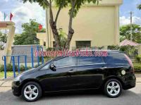 Cần bán gấp xe Mitsubishi Grandis 2.4 AT 2009 màu Đen